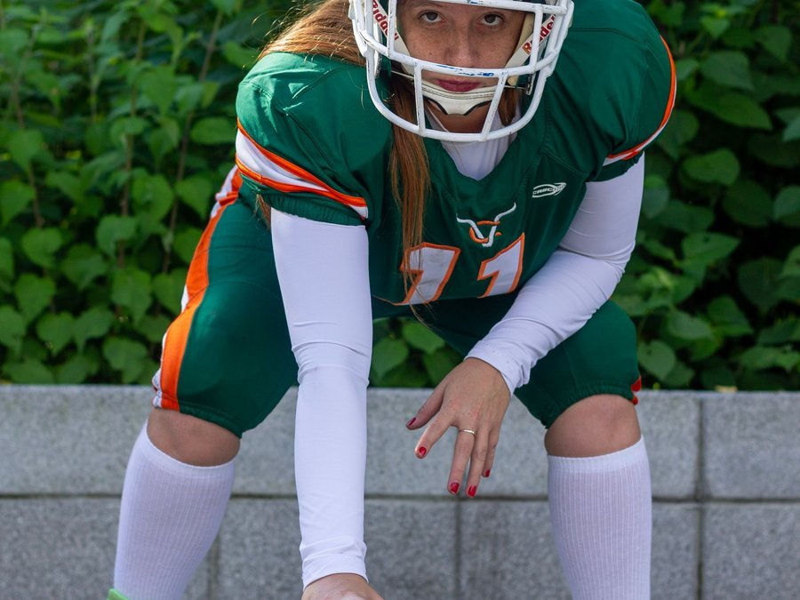 American football player in a three-point stance