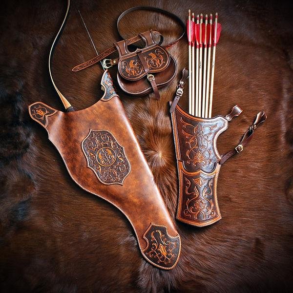 Leather archery accessories — quiver, arm guard, and pouch
